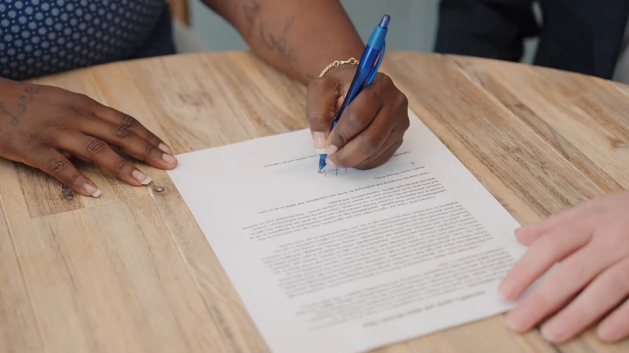 Signing the shared-equity agreement